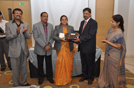 Tab gifted by zonal manager for mdrt 2013. from left: shri milind mane, shri pattanayak, shri prasad & sr.sales manager mrs borkar)